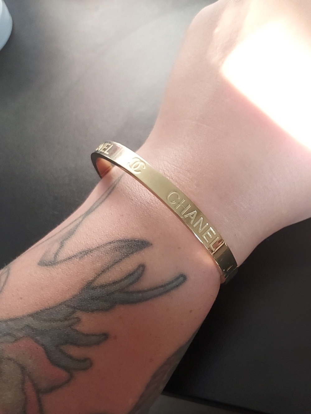 CHANEL Gold Logo Engraved Slim Bangle Bracelet